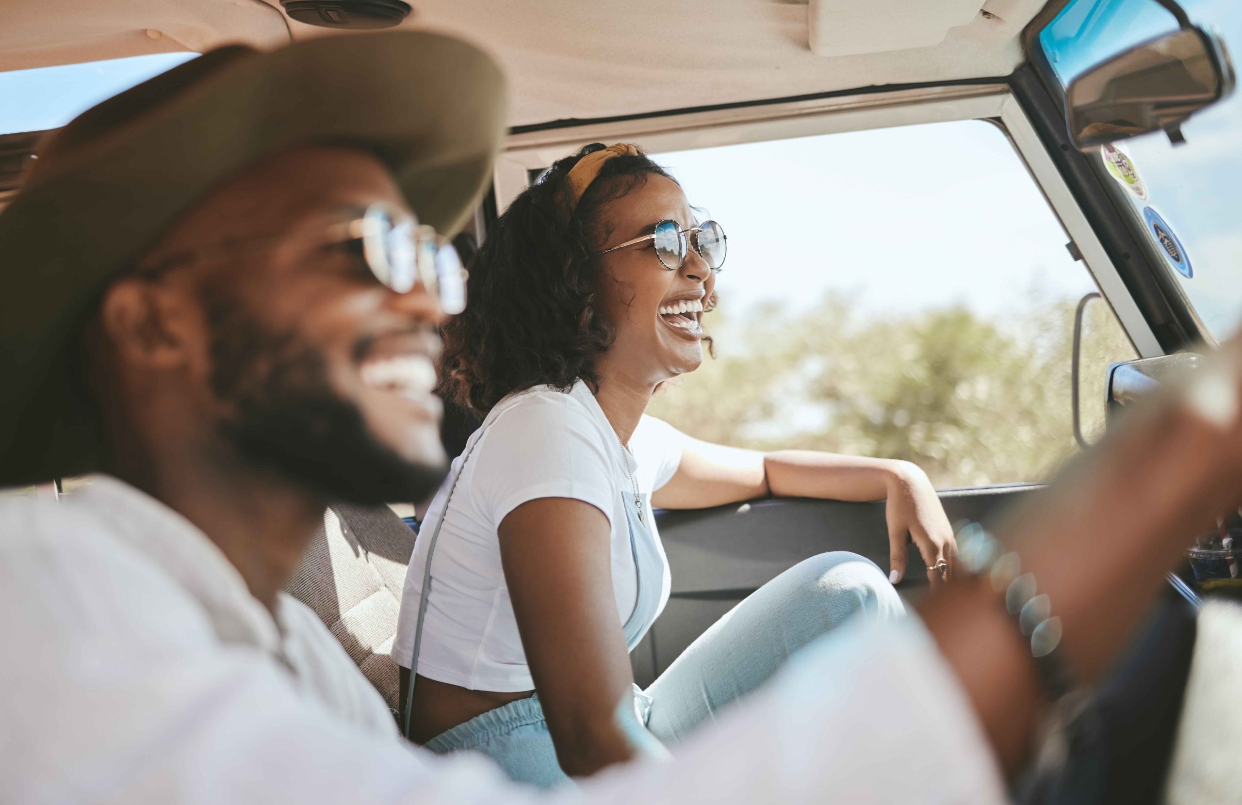 Couple happy in new car